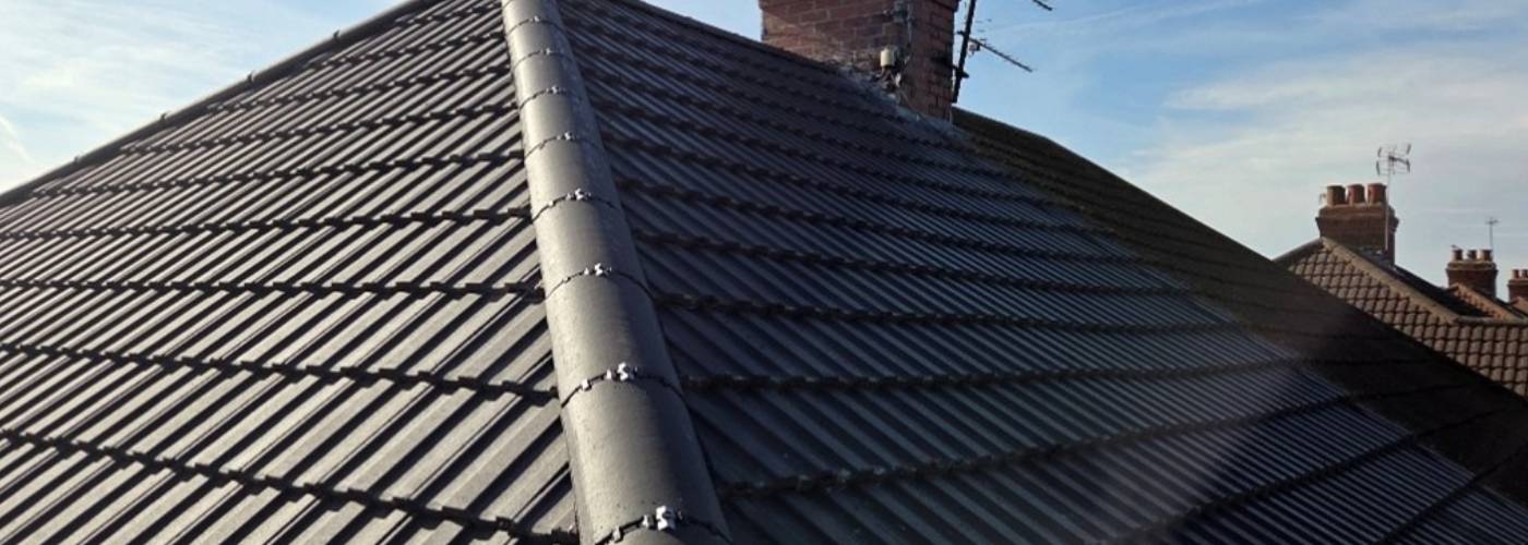 New ridge tiles on a completed pitched roof